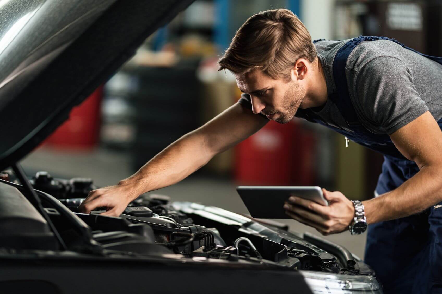 Technician working on engine